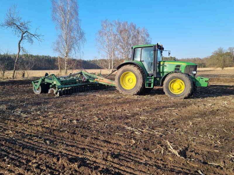 John Deere 6830 i Catros 5500