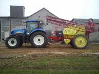 New Holland T6080 i Ikarus S38